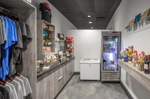 a walk in closet with a refrigerator in it at The Summit Hotel in Cincinnati