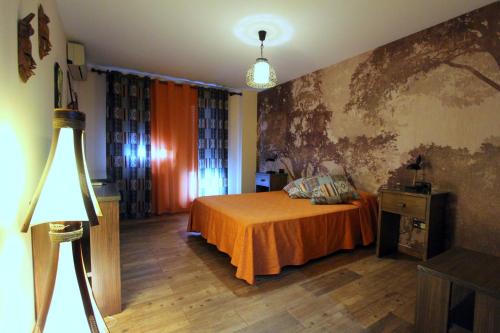 Ένα ή περισσότερα κρεβάτια σε δωμάτιο στο Hostal Mont Royal