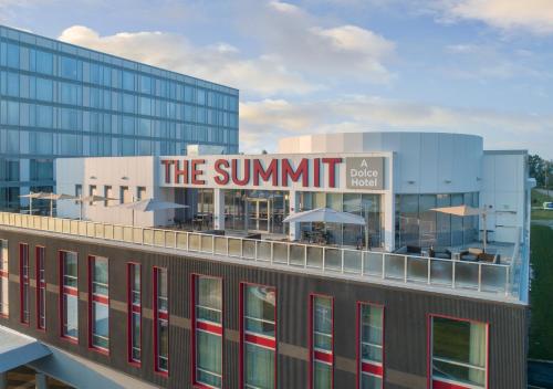 a building with a sign on top of it at The Summit Hotel in Cincinnati