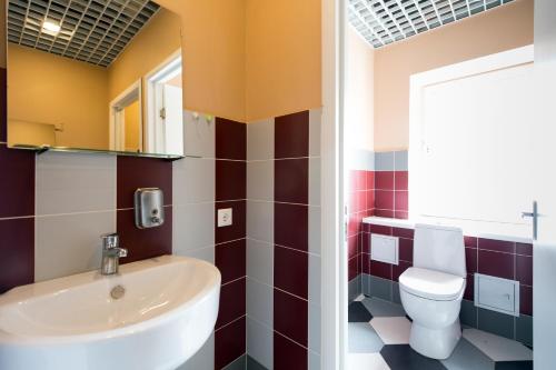 Ванная комната в Макаров Хостел 
