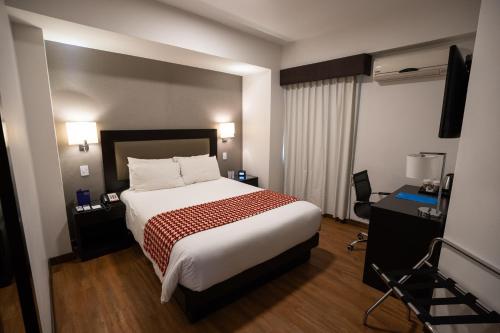 Postel nebo postele na pokoji v ubytování Wyndham Costa del Sol Piura