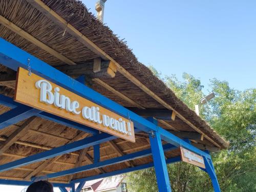 a sign for blue oil worth at a bus stop at Stuffino Crisan in Crisan