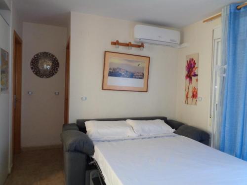 Posteľ alebo postele v izbe v ubytovaní Apartamento Calle Fundadores