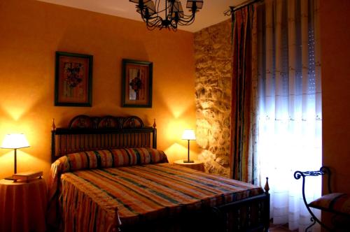 Postelja oz. postelje v sobi nastanitve Casa Rural Valle Esgueva