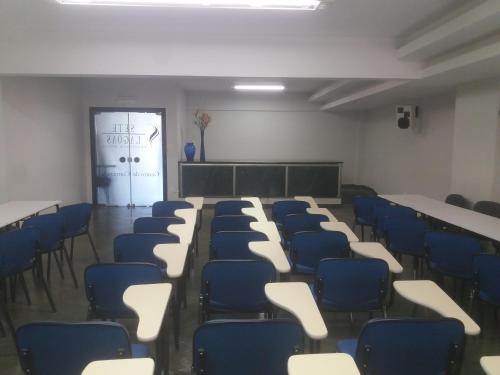 El área de trabajo o centro de convenciones de Sete Lagoas Residence Hotel