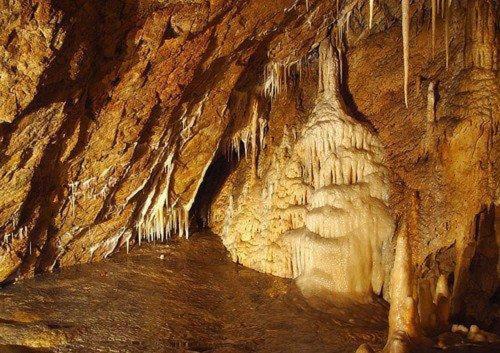 a cave with a painting of a cave entrance at Hotel i Restauracja ABIS in Bystrzyca Kłodzka