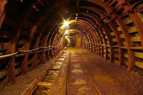 a tunnel with a person walking through it at Hotel i Restauracja ABIS in Bystrzyca Kłodzka