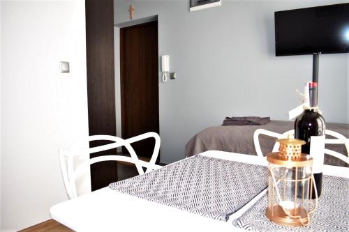 Televízia a/alebo spoločenská miestnosť v ubytovaní Apartament Fibra Cortado