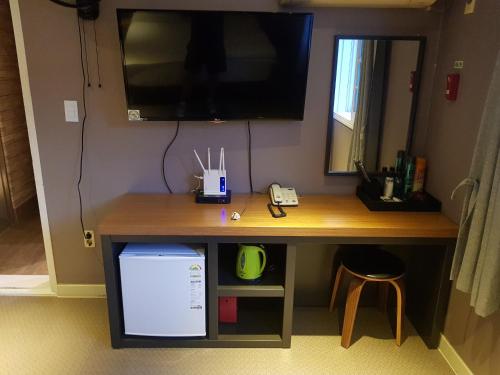 Kuchyň nebo kuchyňský kout v ubytování Sunshine Motel