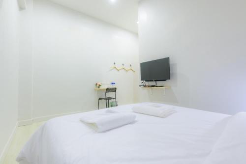 Katil atau katil-katil dalam bilik di Metro hotel