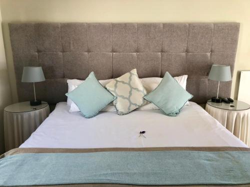Ένα ή περισσότερα κρεβάτια σε δωμάτιο στο Sandra's Guest House