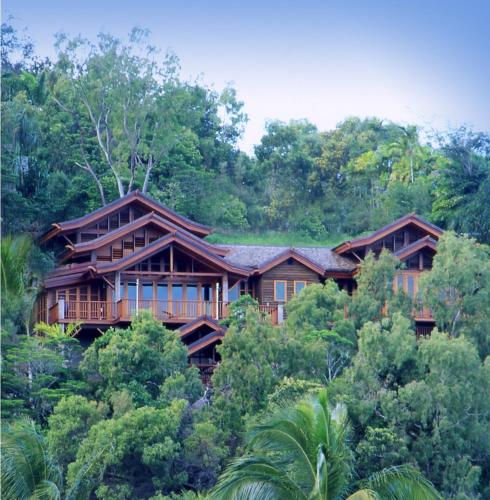 a house in the middle of the forest at Villa Empat Puluh Dua in Port Douglas