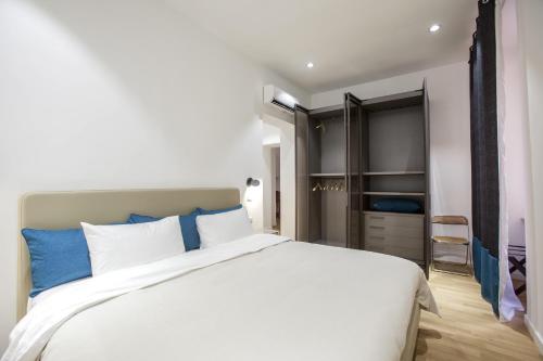 Voodi või voodid majutusasutuse Dimoro Suite toas