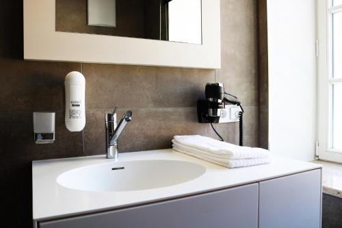Kylpyhuone majoituspaikassa BG Hotel by WMM Hotels