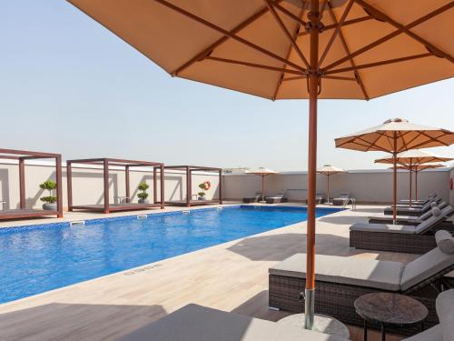 Flora Inn Hotel Dubai Airport Image