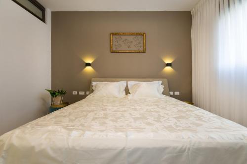 Postel nebo postele na pokoji v ubytování Maorissimo Boutique Apartment