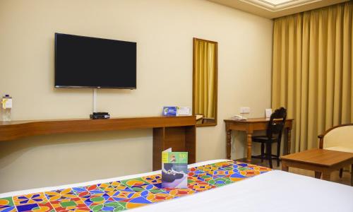 TV a/nebo společenská místnost v ubytování Prazeres Boutique Hotel
