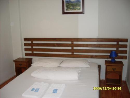 Giường trong phòng chung tại Casa Oana