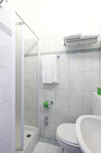 a bathroom with a toilet and a sink and a shower at Albergo Al Carugio in Monterosso al Mare