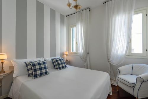 En eller flere senge i et værelse på Ca' Riva San Marco