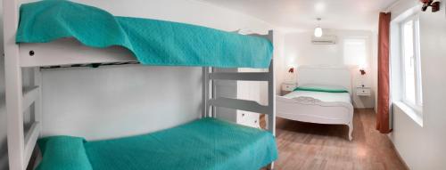 Postel nebo postele na pokoji v ubytování Hostal Casa Aborigen