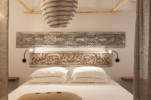 Postel nebo postele na pokoji v ubytování Graviana - Pedra Negra Charming House