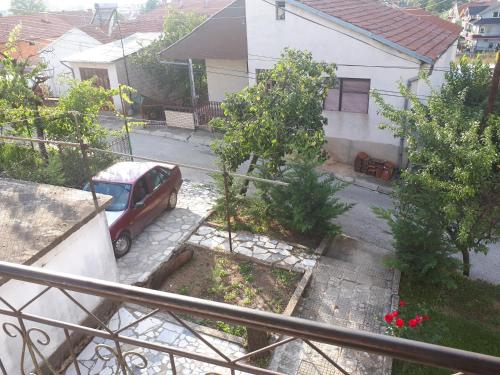 a car parked in front of a house at Iliovski Inn - Just Like Home in Prilep