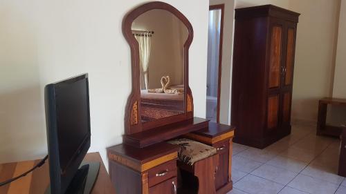 TV a/nebo společenská místnost v ubytování Hotel My Lovina