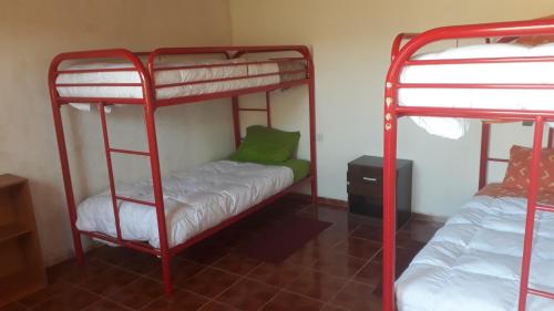Voodi või voodid majutusasutuse Hostal Open House toas