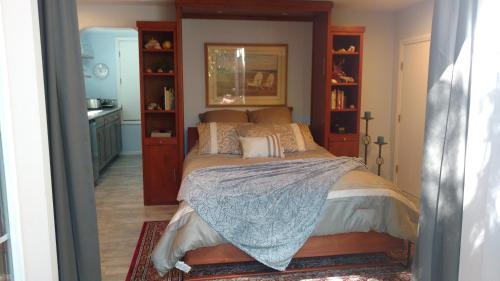 a bedroom with a large bed in a room at Casa Tranquility in San Diego