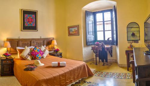 Ένα ή περισσότερα κρεβάτια σε δωμάτιο στο Hotel Convento Santa Catalina by AHS