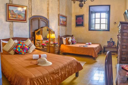 Ένα ή περισσότερα κρεβάτια σε δωμάτιο στο Hotel Convento Santa Catalina by AHS