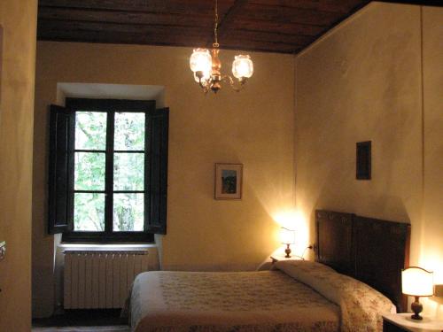 Ліжко або ліжка в номері Locanda Dei Baroni - Antica Dimora