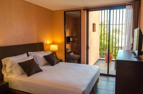 Katil atau katil-katil dalam bilik di Oasis Fresh Hotel