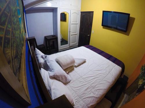 Postel nebo postele na pokoji v ubytování Hotel Boutique Casa José