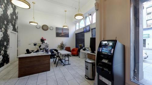 a room with a video game machine in a store at Warfield Hotel in San Francisco