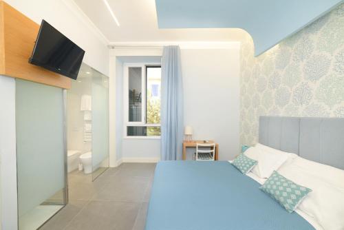 Posteľ alebo postele v izbe v ubytovaní In Centro B&B