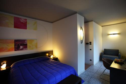 Postel nebo postele na pokoji v ubytování Hotel Zeffiro