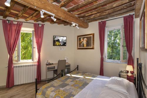 Кровать или кровати в номере Art Gallery B&B