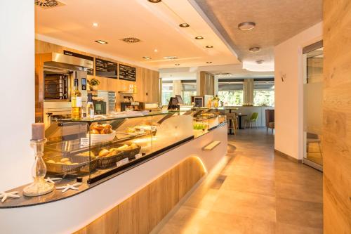 a kitchen with a counter with food on it at Düne 74 in Ostseebad Karlshagen