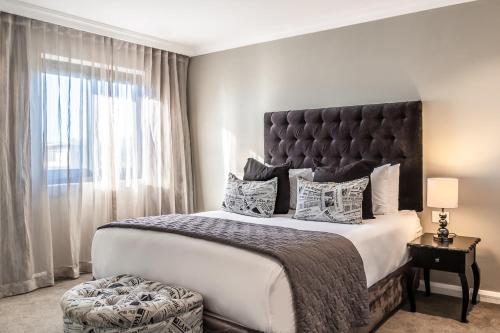 Letto o letti in una camera di Bliss Boutique Hotel