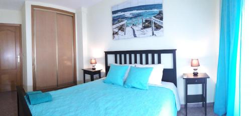 Un ou plusieurs lits dans un hébergement de l'établissement Casa Llorca Big Apt 3 Bedroom Garage AC WiFi