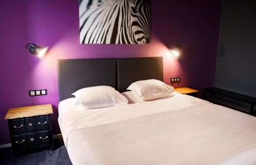 Cama o camas de una habitación en Cit'Hotel B Hotel Brasserie