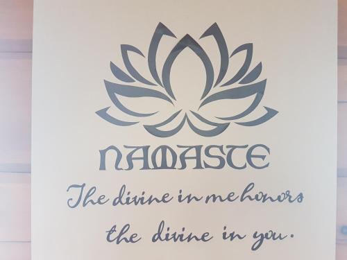 a poster with a lotus flower and the text the distance the distance in you at The Spirit Rock Outpost & Lodge in Wiarton