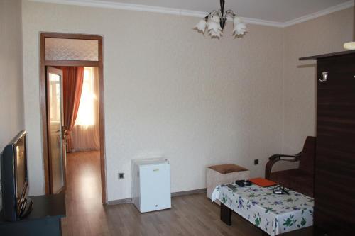 TV a/nebo společenská místnost v ubytování Ivanovka Guest House