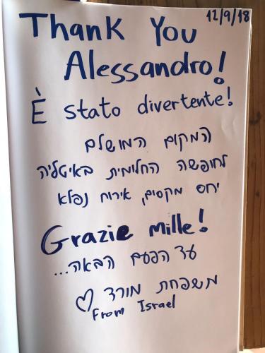 a handwritten thank you note with blue handwriting at Corte Attilea in Valeggio sul Mincio