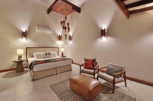 Katil atau katil-katil dalam bilik di Camurim Grande Pousada & SPA - Jantar Incluído