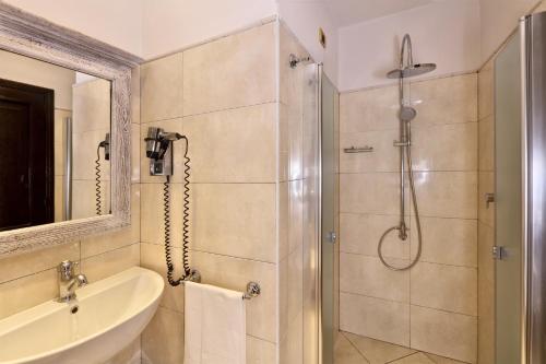 a bathroom with a shower and a sink at Villa Angela in Taormina