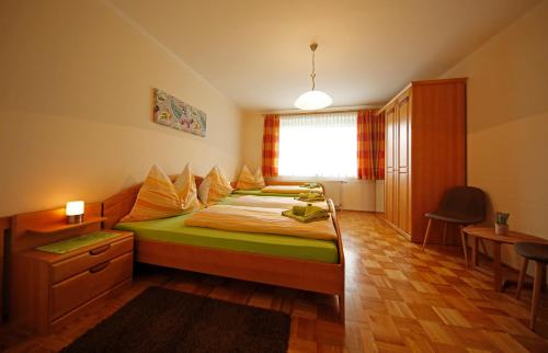 Postel nebo postele na pokoji v ubytování Appartement Helga