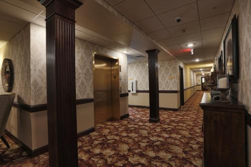 a hallway of a hotel with at Arrow Hotel in Broken Bow